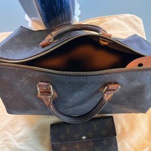Louis Vuitton bag and wallet. Bag is a 1988 Speedy with hallmark. Very nice!!